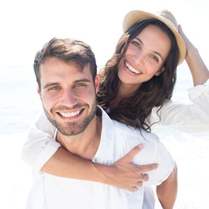 smiling couple on the beach