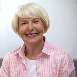 Woman with dental implants in Jacksonville