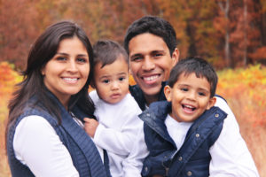 autumn portrait of a smiling family